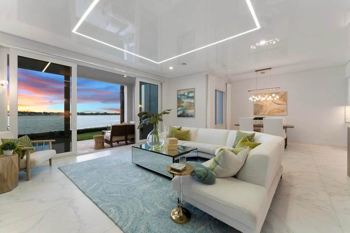 100 Water Club Ct N_Living Room Twilight at 100 Water Club Court, North Palm Beach