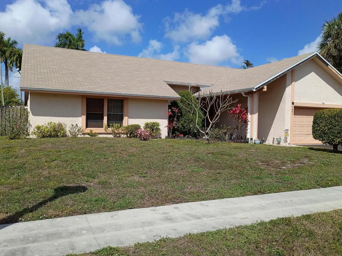 McKenzie front yard 1 at 7401 NW 49th Court, Lauderhill