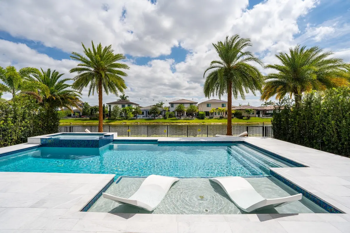 Private lakefront heated pool and spa at 10822 Oceano Way, Parkland