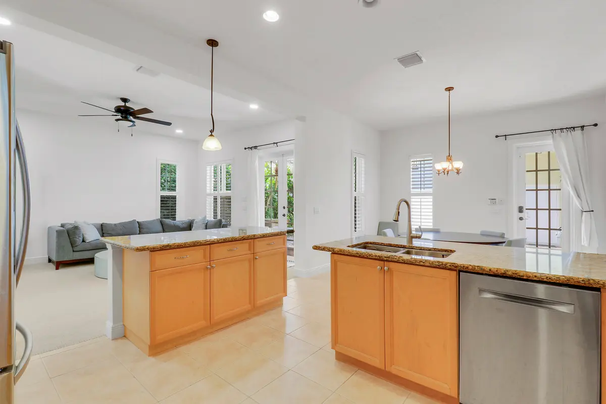 Kitchen and Great Room at 108 Spikerush Road, Jupiter