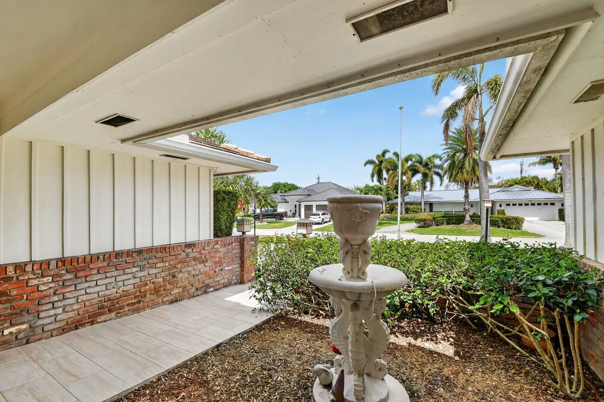 Covered Front Entrance at 229 Walton Heath Drive, Atlantis