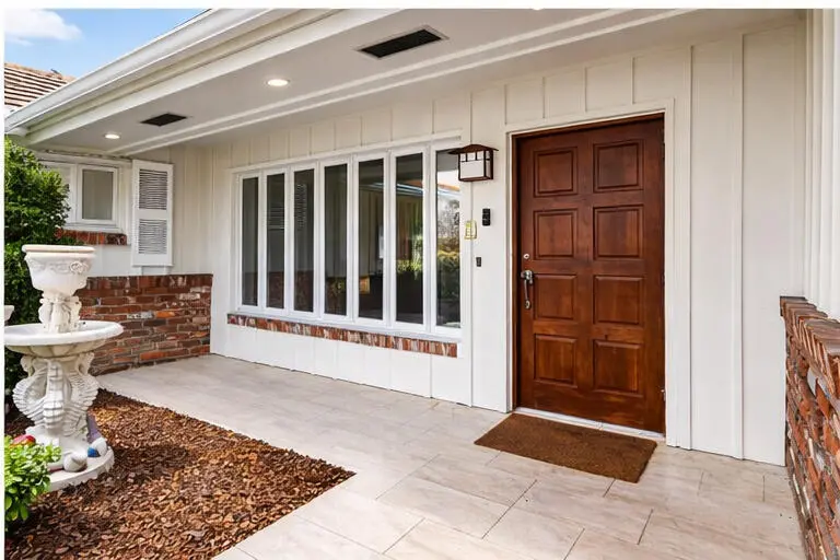 Covered Front Entry at 229 Walton Heath Drive, Atlantis
