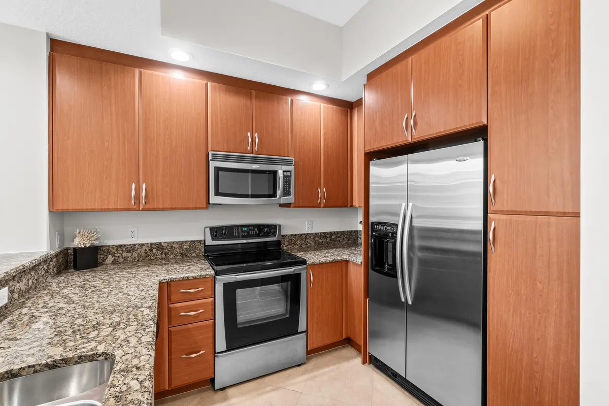 Kitchen w/ Exceptional Storage at 701 S Olive Avenue 1209, West Palm Beach