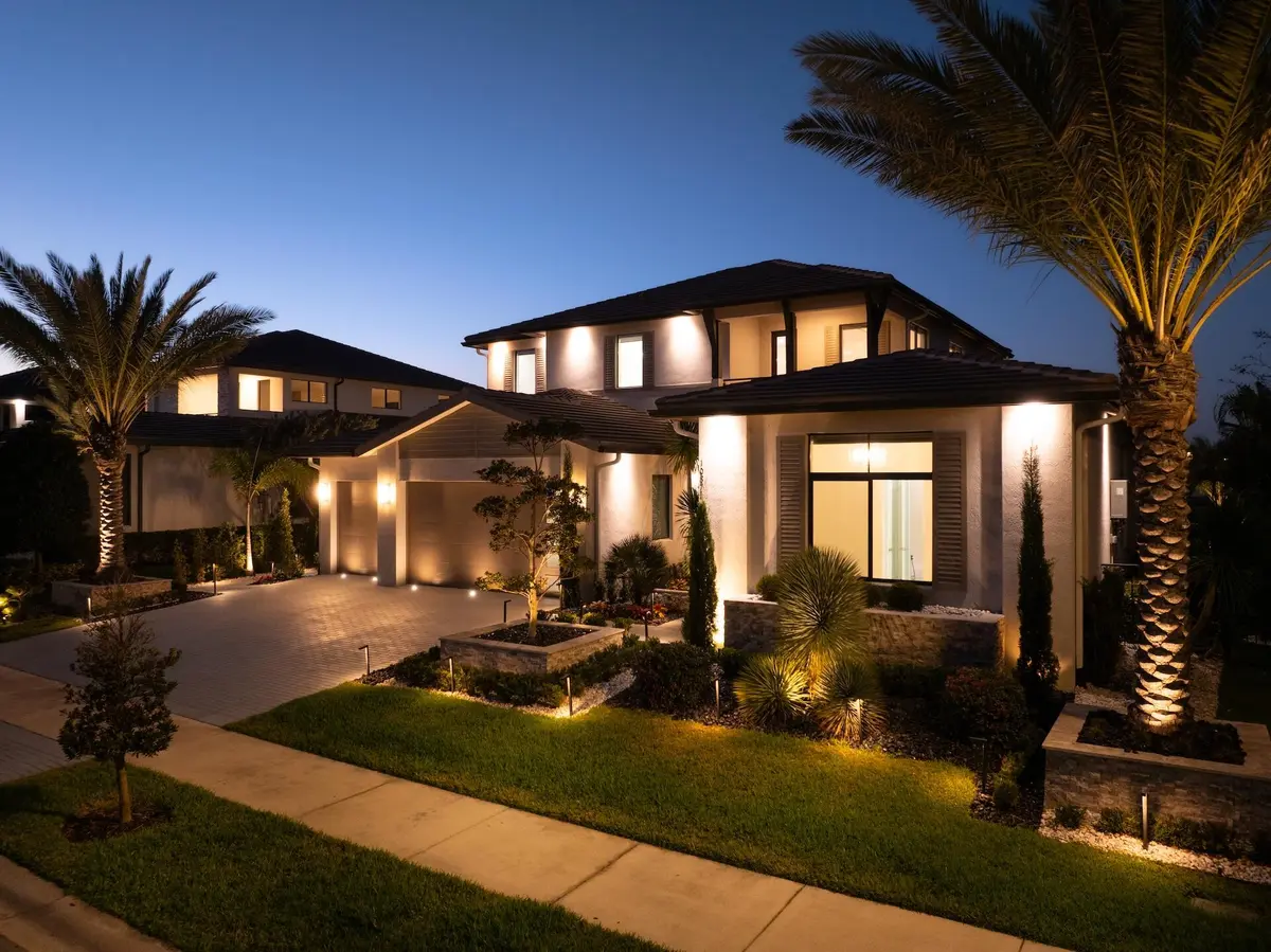 Custom landscaping and lighting at 10875 Estuary Drive, Parkland