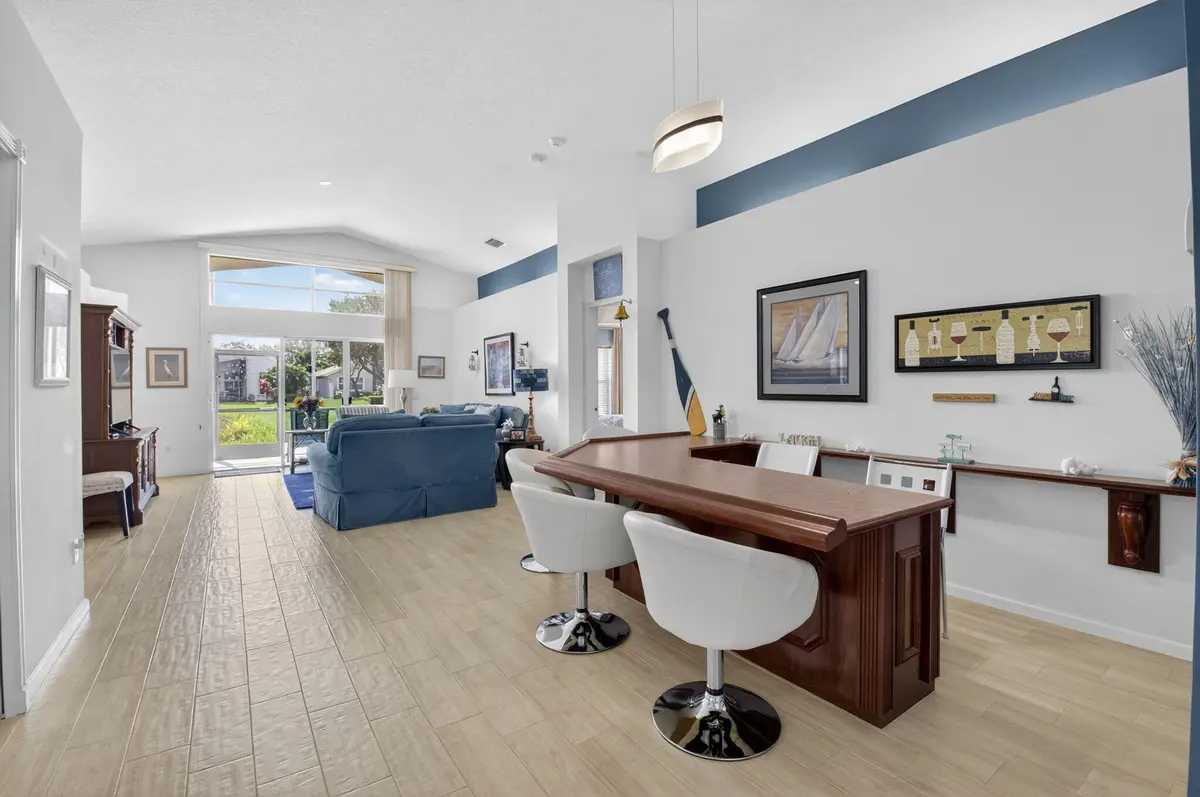 Dining room converted to a bar/lounge at 7094 Avila Terrace Way, Delray Beach