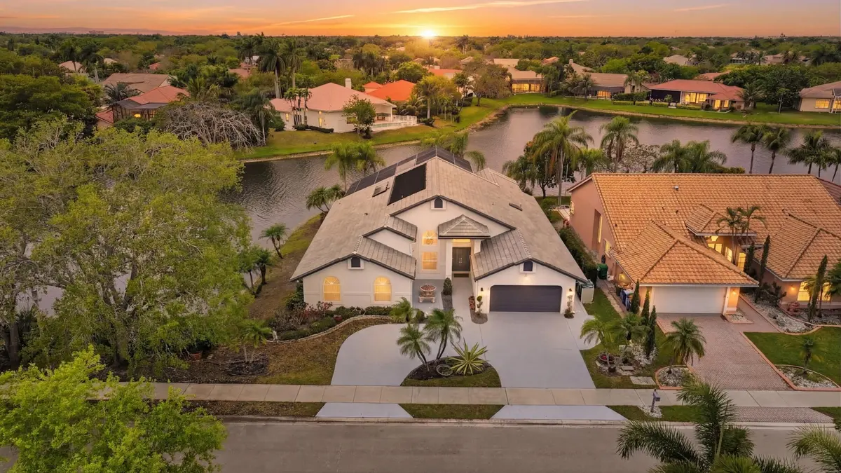 1_002_dji_20260317105358_0019_d_twilight at 5022 NW 100th Terrace, Coral Springs