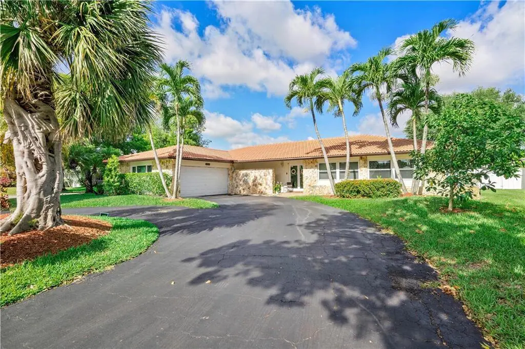 Exterior front at 208 NW 91st Avenue, Coral Springs