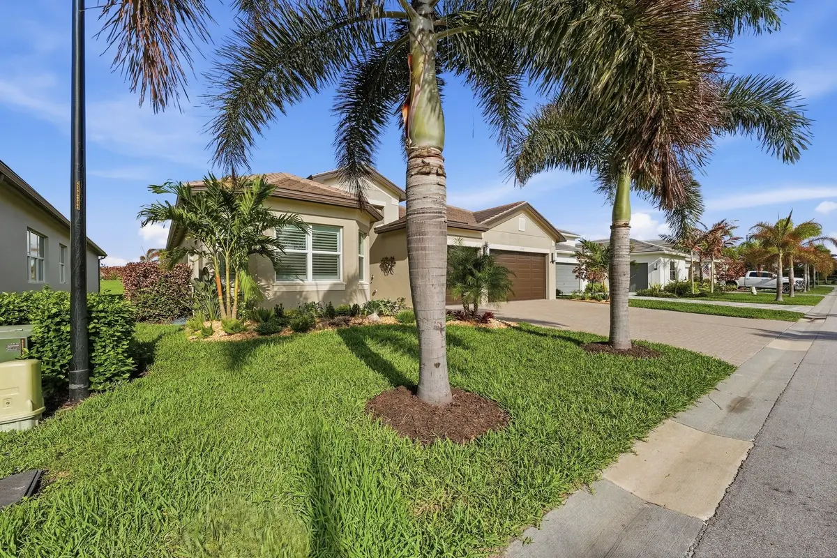 Beautiful upgraded landscaping at 11968 SW Whitewater Falls Court, Port St. Lucie