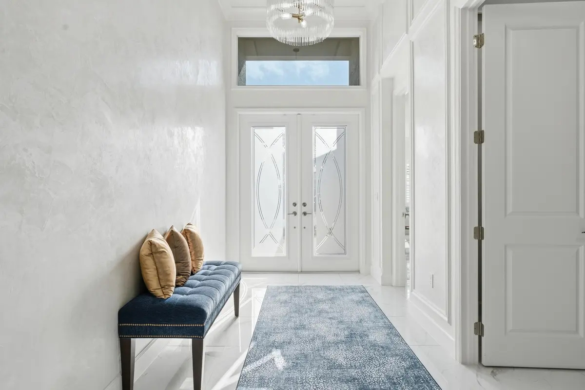 Enter through double glass doors at 11968 SW Whitewater Falls Court, Port St. Lucie