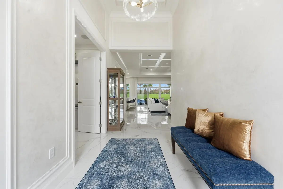 High ceiling foyer with faux paint at 11968 SW Whitewater Falls Court, Port St. Lucie
