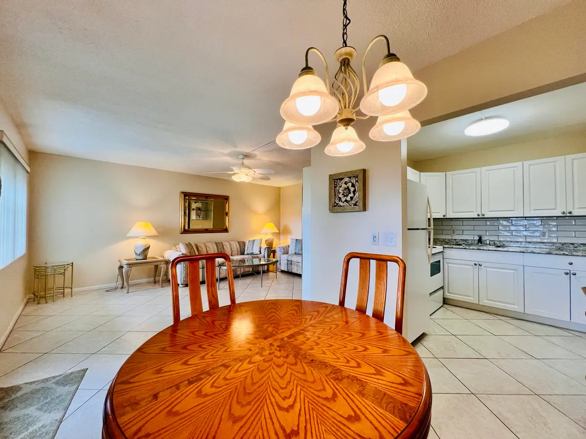 Dining to Living at 27 Sheffield B, West Palm Beach