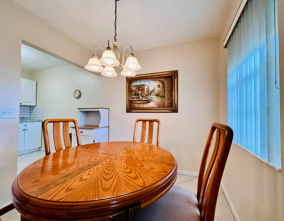 Dining to Kitchen at 27 Sheffield B, West Palm Beach