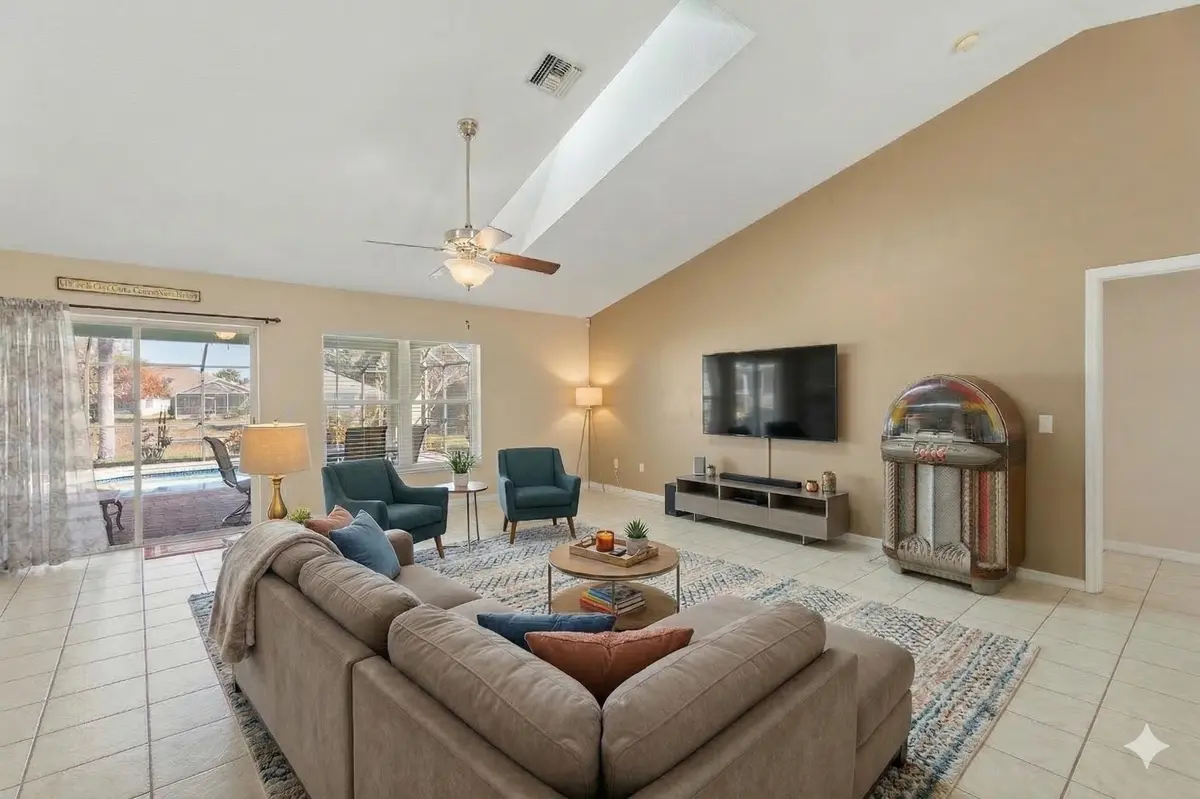 Living room virtually staged at 5593 NW Wesley Road, Port St. Lucie