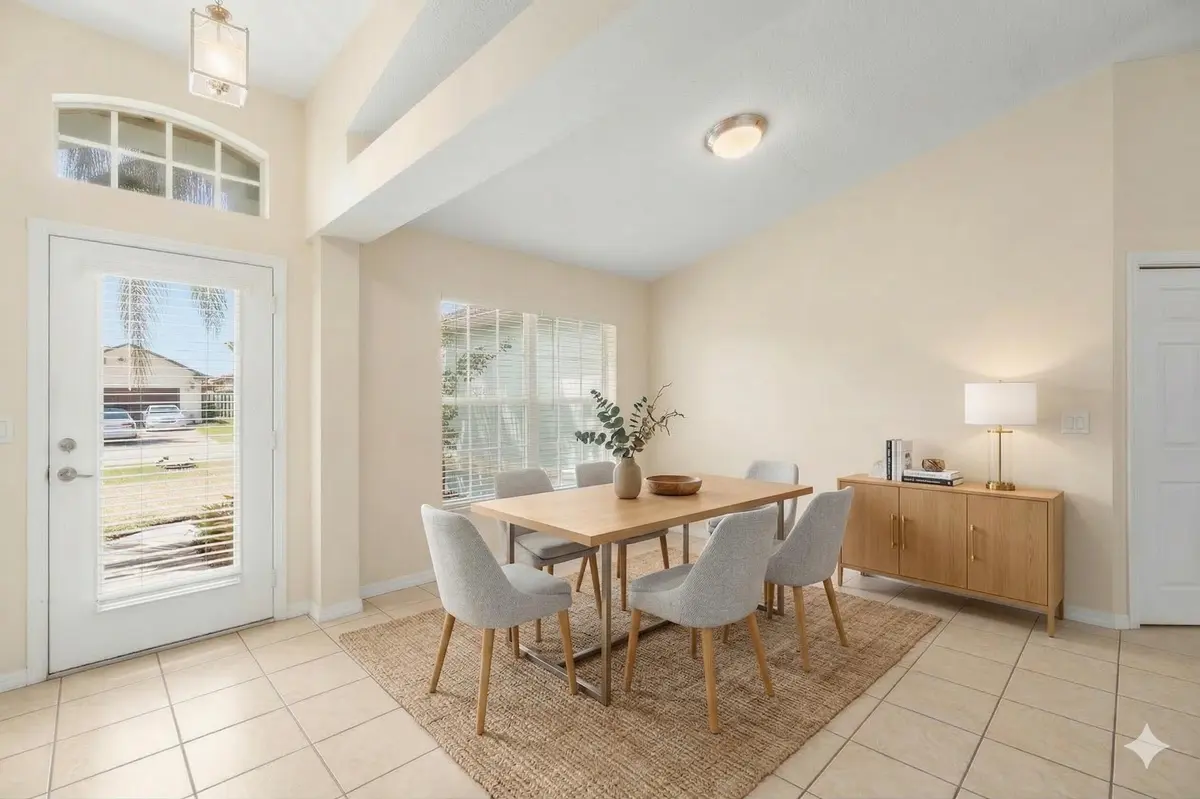 Dining room virtually staged at 5593 NW Wesley Road, Port St. Lucie