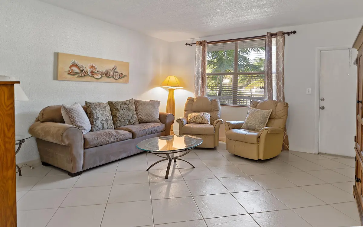 Living room at 2565 S Ocean Boulevard 208, Palm Beach