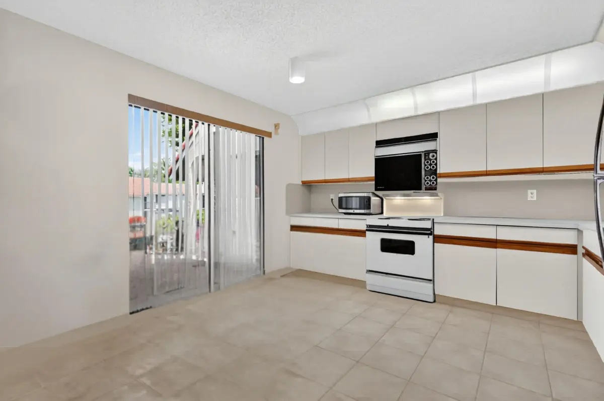 Kitchen empty at 5561 Fairway Park Drive 203, Boynton Beach