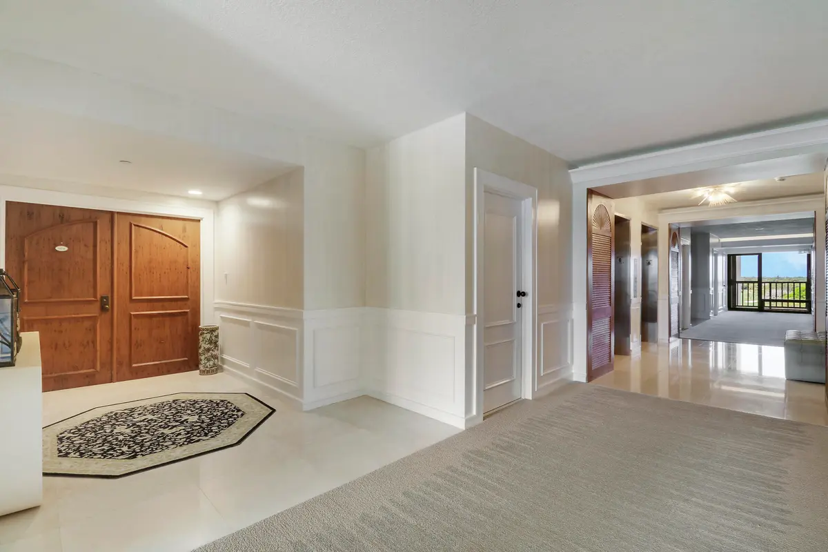 Hallway and Entry at 3322 Casseekey Island Road 604, Jupiter