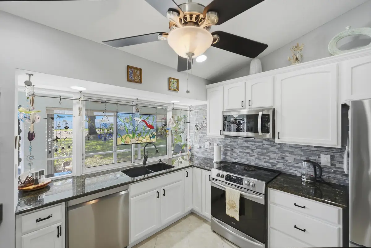 kitchen-pass-through- window-torino-psl at 5754 NW Jigsaw Lane, Port St. Lucie