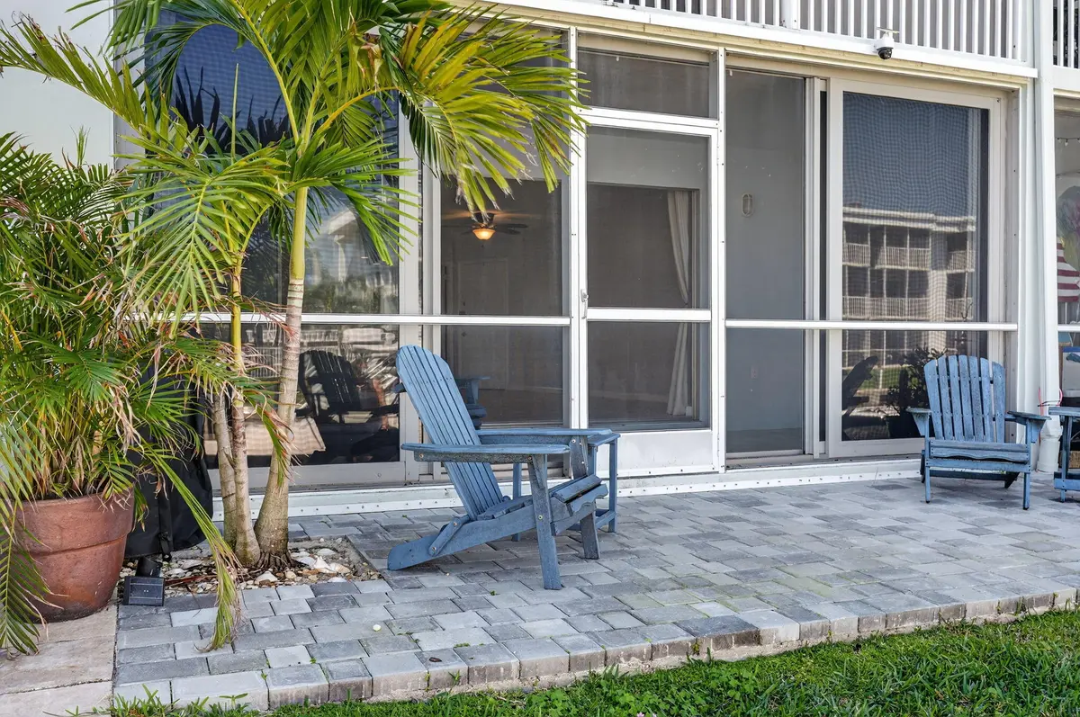 outdoor pavered patio at 121 Wettaw Lane 112, North Palm Beach