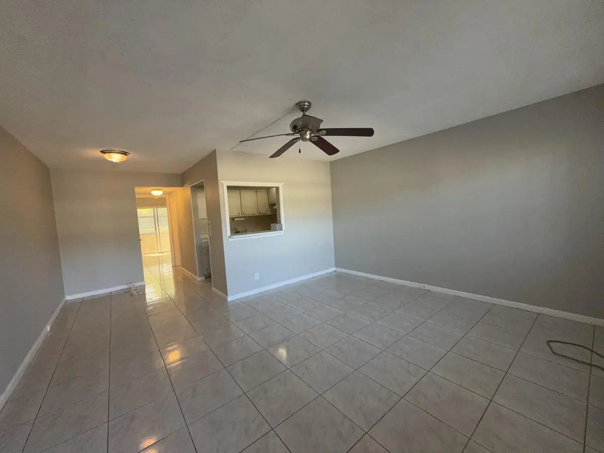 Living Room/Dining Area at 166 Sussex I, West Palm Beach