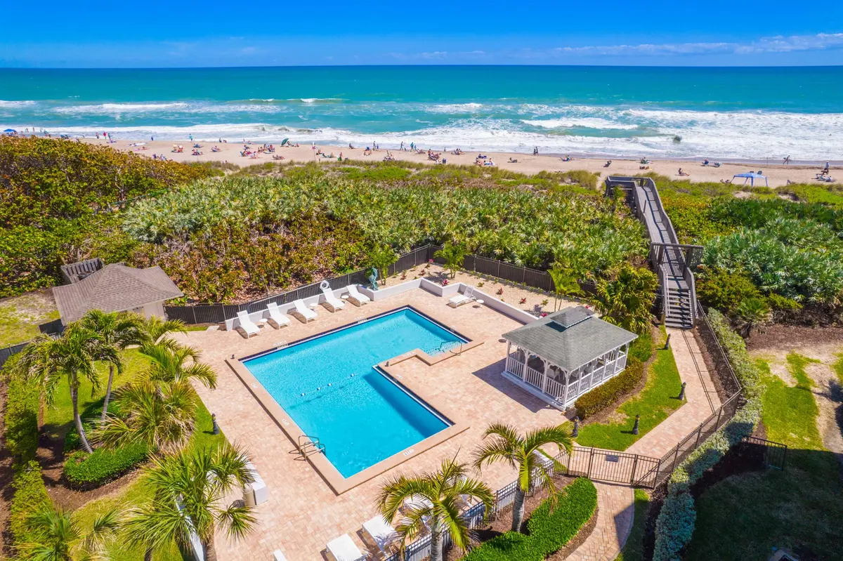 Ocean Terrace pool and beach at 669 NE Plantation Road 308, Hutchinson Island