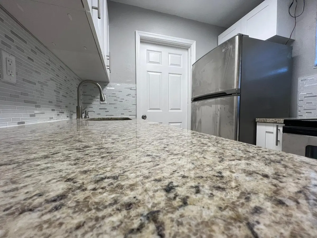 WOOD KITCHEN W/GRANITE COUNTERS at 3265 E Palm Drive, Boynton Beach