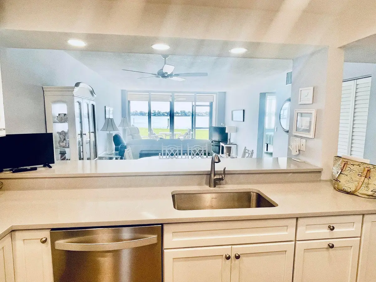 view to river from kitchen 13-104 at 1950 SW Palm City Road 13104, Stuart