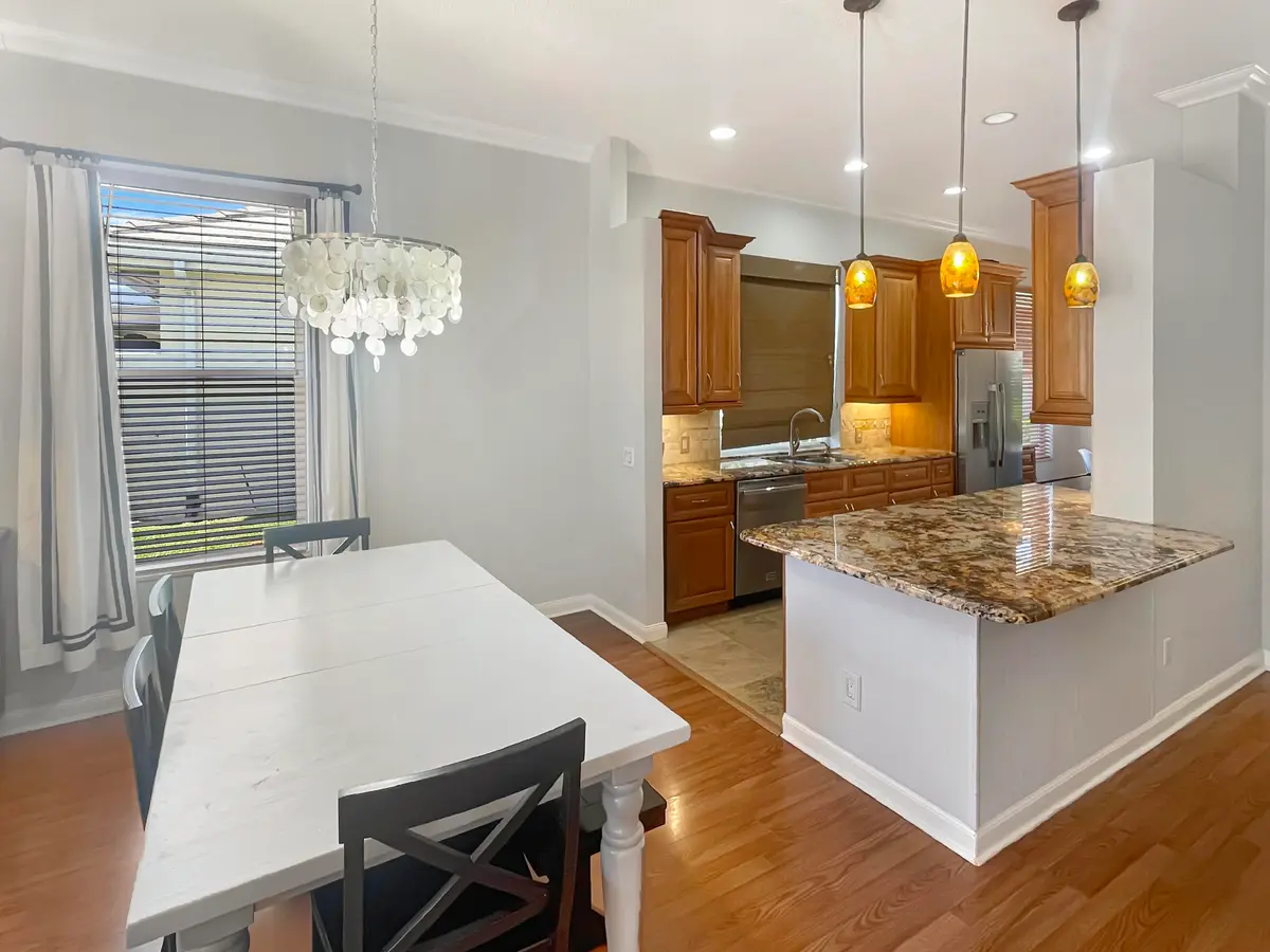 Dining room and kitchen at 2913 SW Brighton Way, Palm City