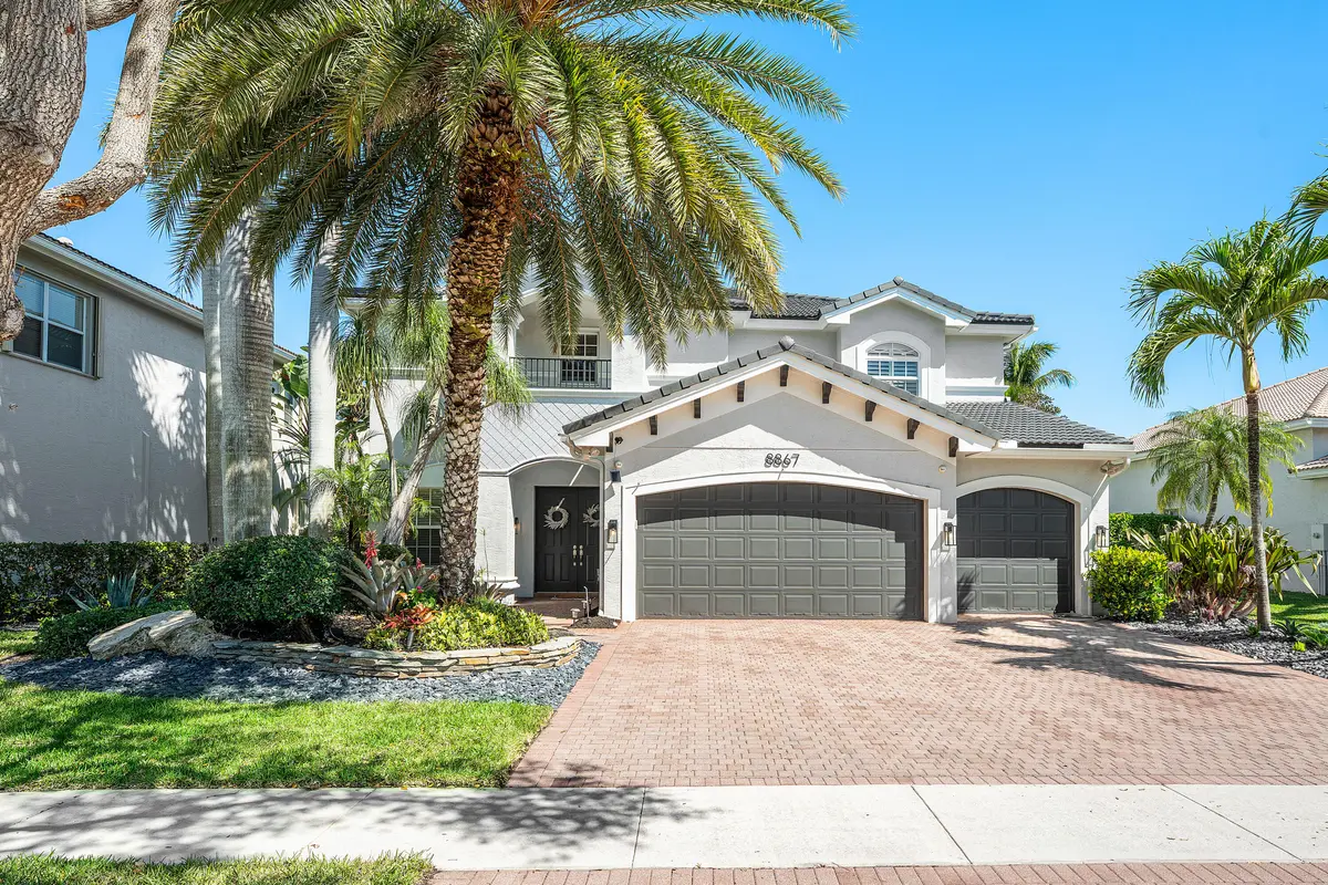 Lushly Landscaped Exerior at 8867 Starhaven Cove, Boynton Beach