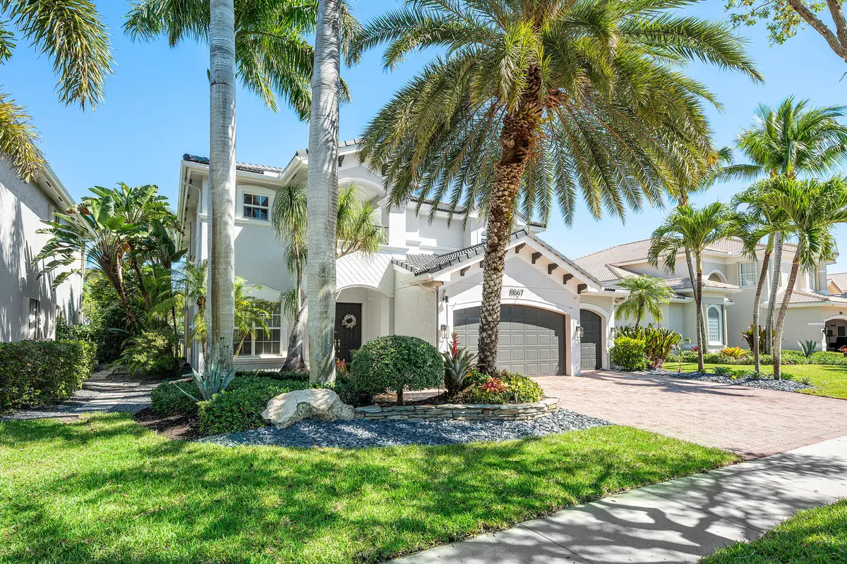 Lushly Landscaped Exerior at 8867 Starhaven Cove, Boynton Beach
