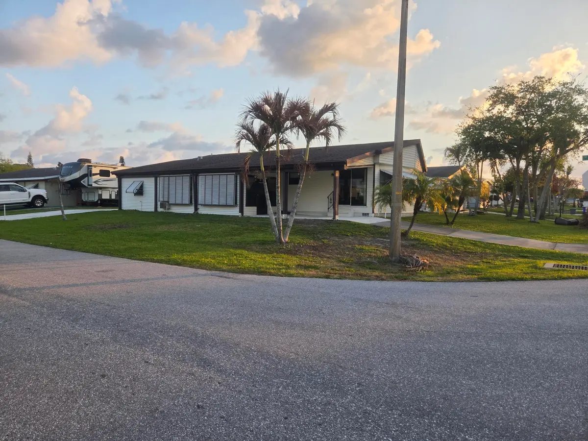 side at 7107 SE Seahawk Street, Hobe Sound