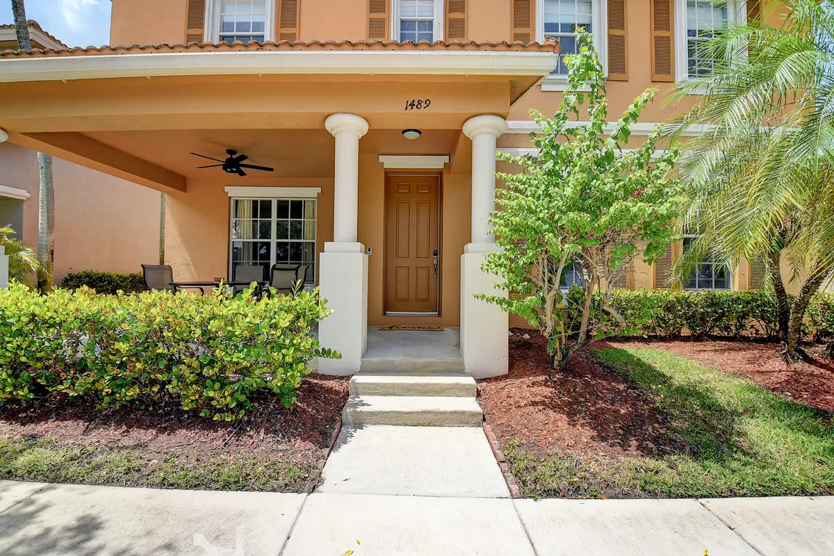 Walking up to the door at 1489 E Bexley Park Drive, Delray Beach