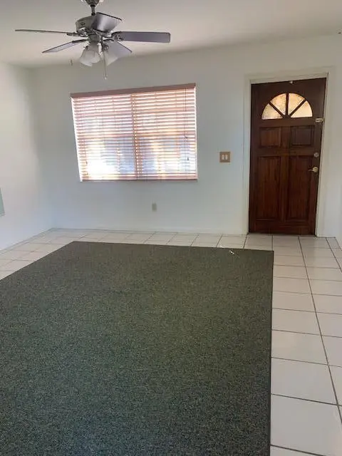 Living Room door to west outside at 512 Biscayne Drive, West Palm Beach