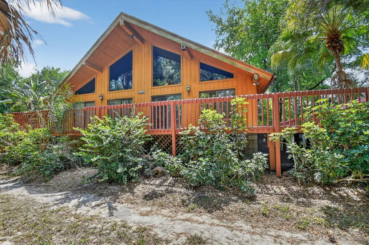North side of house at 12140 57th Rd Road, West Palm Beach