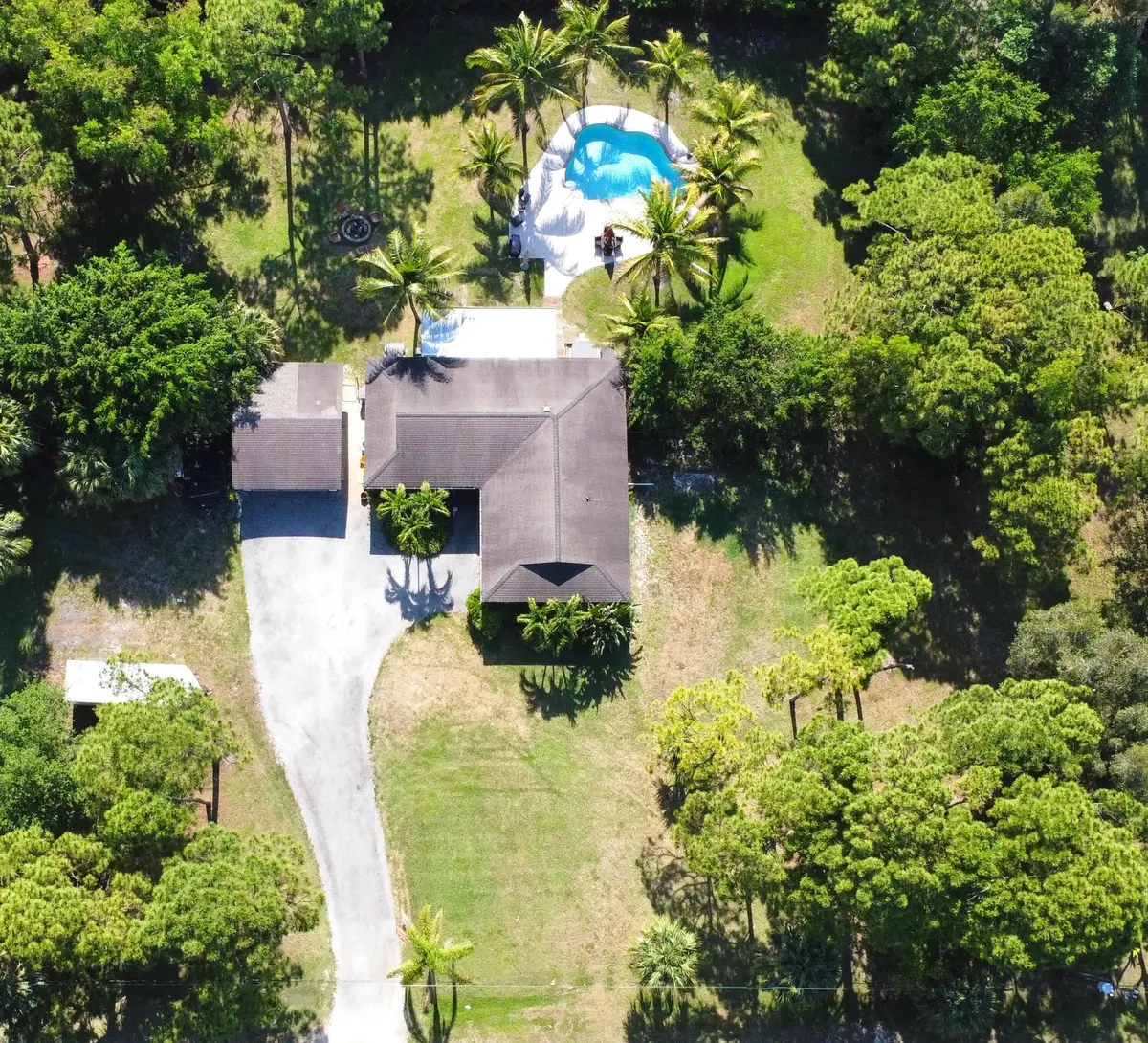 exrerior home at 14771 N 66th Trl Trail, Palm Beach Gardens