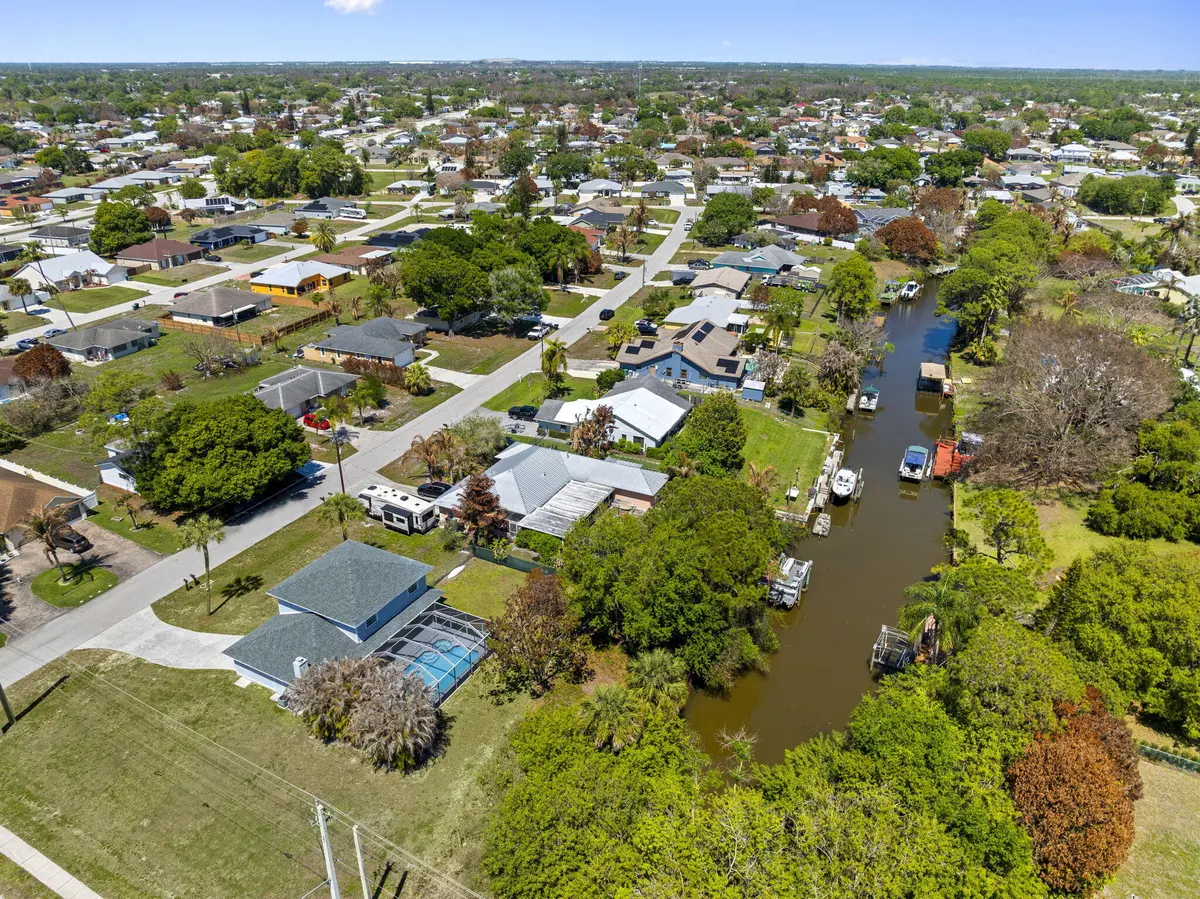 Backyard St. Lucie River Drone Shot (3) at 405 NE Midvale Street, Port St. Lucie