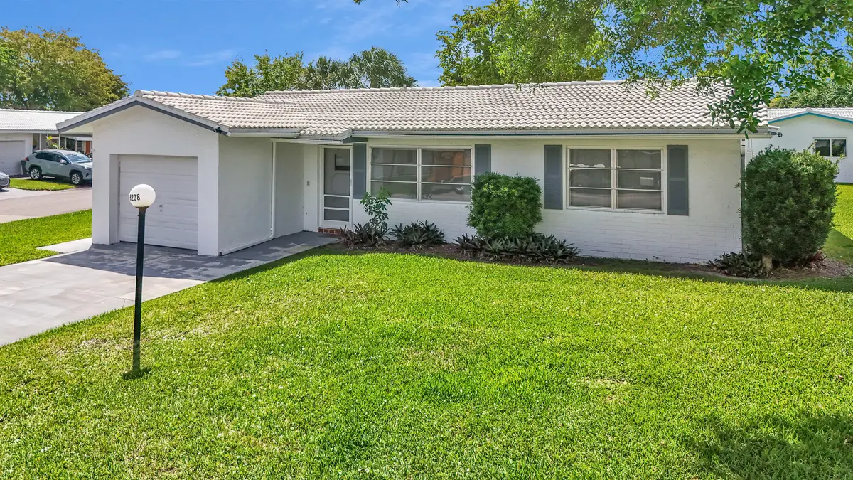 8208 Front Yard2 at 8208 NW 14 Street, Plantation