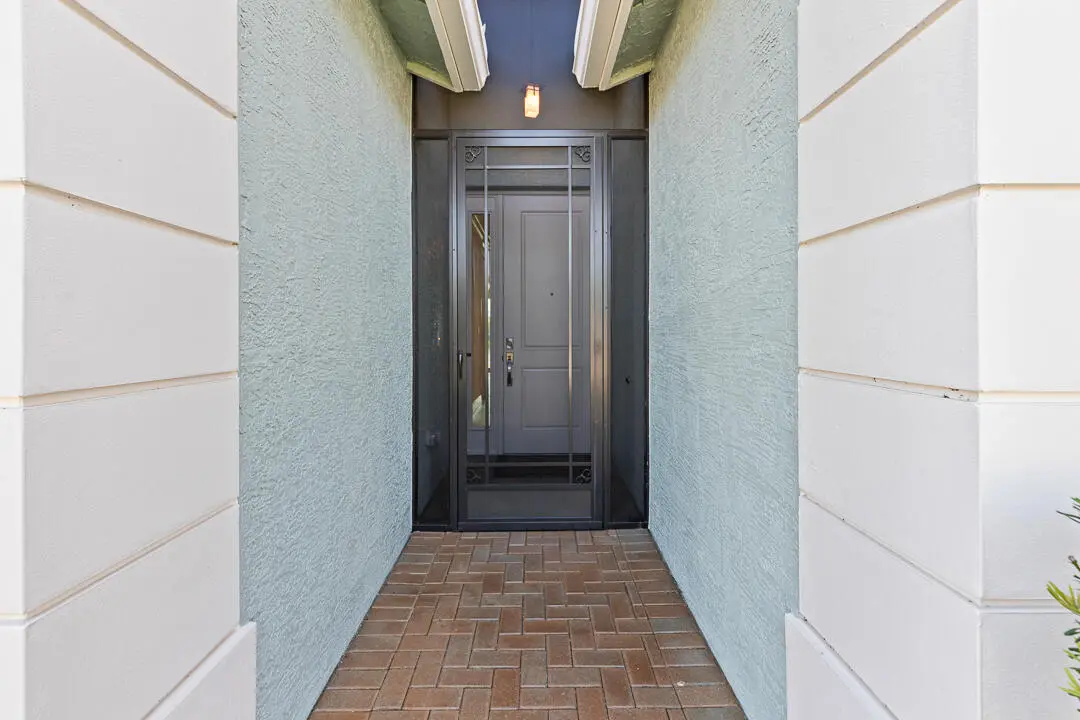 Screened front entry at 12186 SW Jasper Lake Way, Port St. Lucie