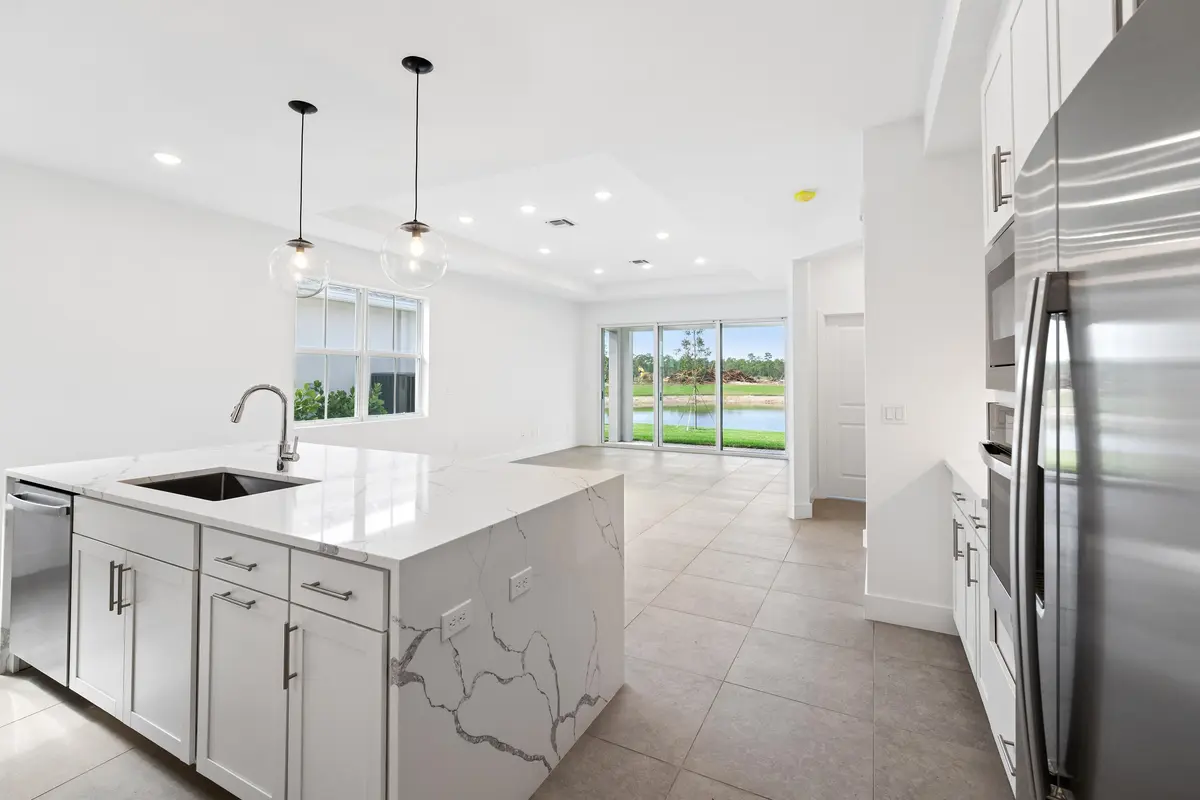 Kitchen, Dining Area & Great Room at 6196 NW Tuckaway Avenue 173, Port St. Lucie