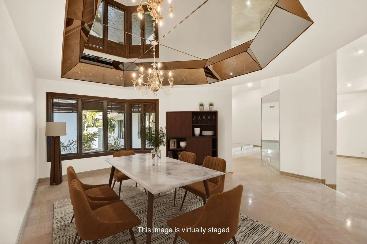 formal dining 2 staged at 2410 Embassy Drive, West Palm Beach