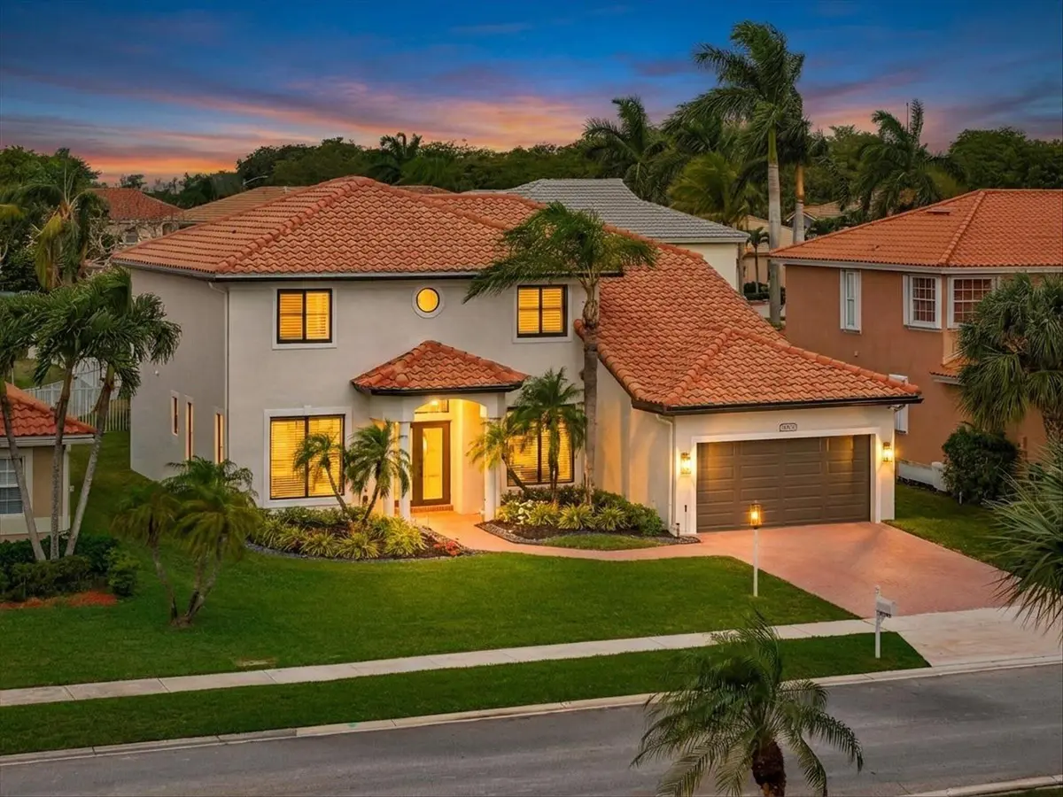Front Exterior Twilight at 21831 Palm Grass Drive, Boca Raton