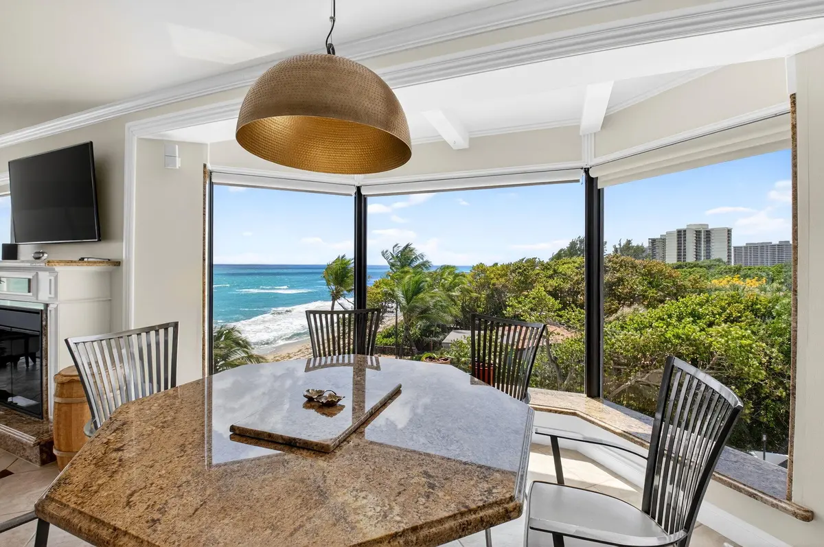 08 Dining Room with Bay Windows at 4605 S Ocean Boulevard 5a, Highland Beach
