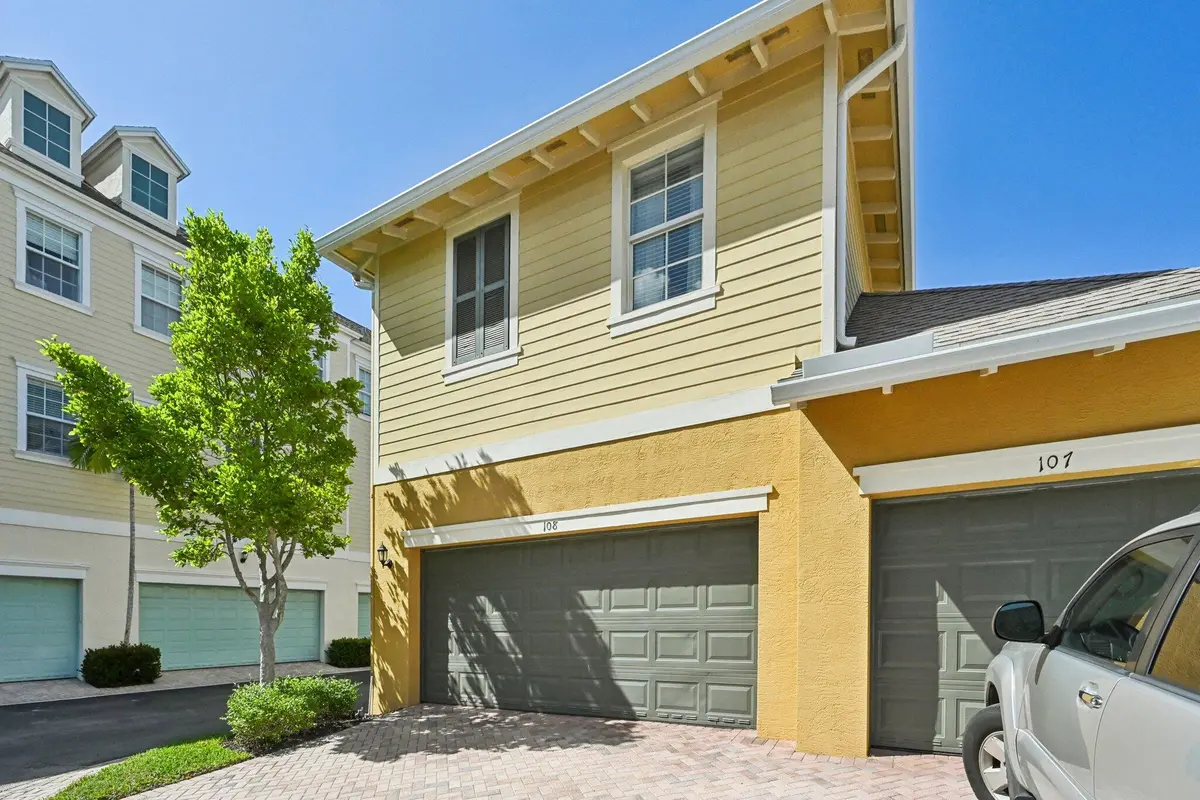 2 car garage in rear at 110 E Pigeon Plum Drive 108, Jupiter