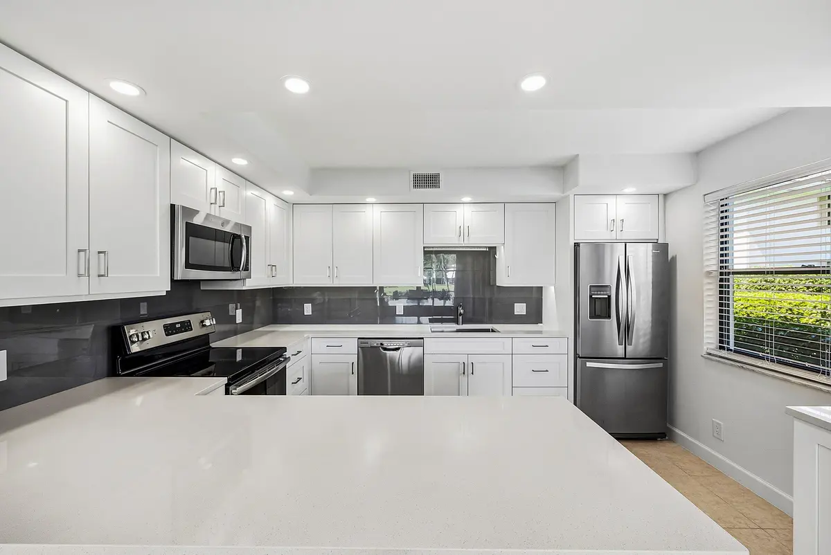 Kitchen at 3682 Quail Ridge  Drive Green Heron S, Boynton Beach