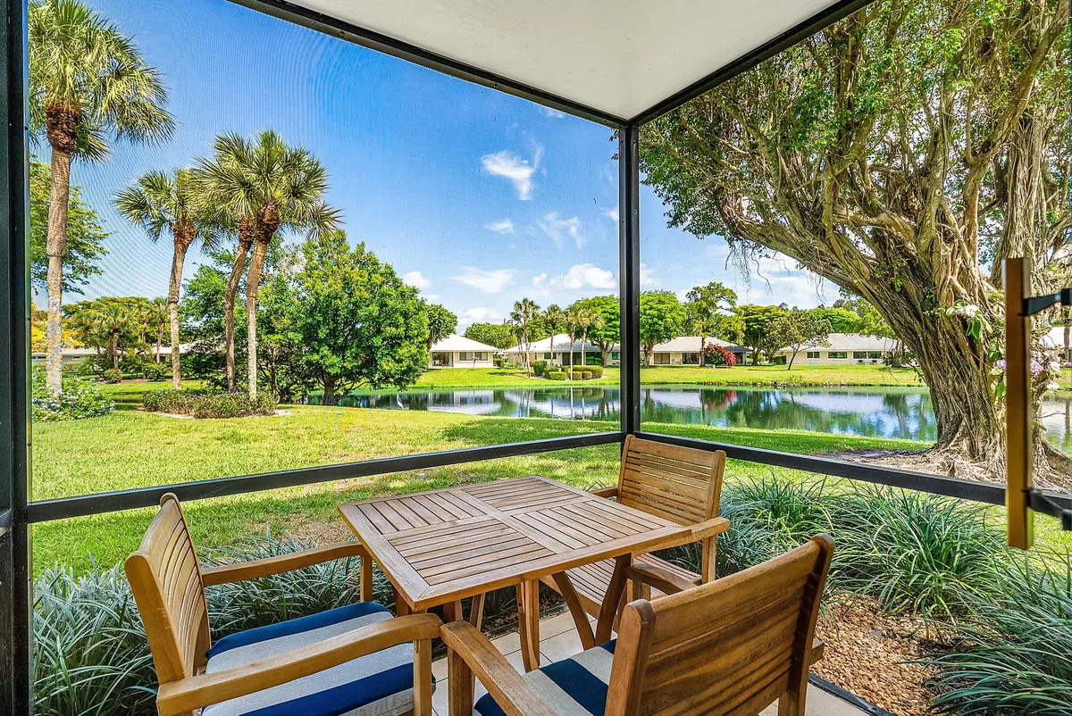 Screened Dining Terrace at 3682 Quail Ridge  Drive Green Heron S, Boynton Beach