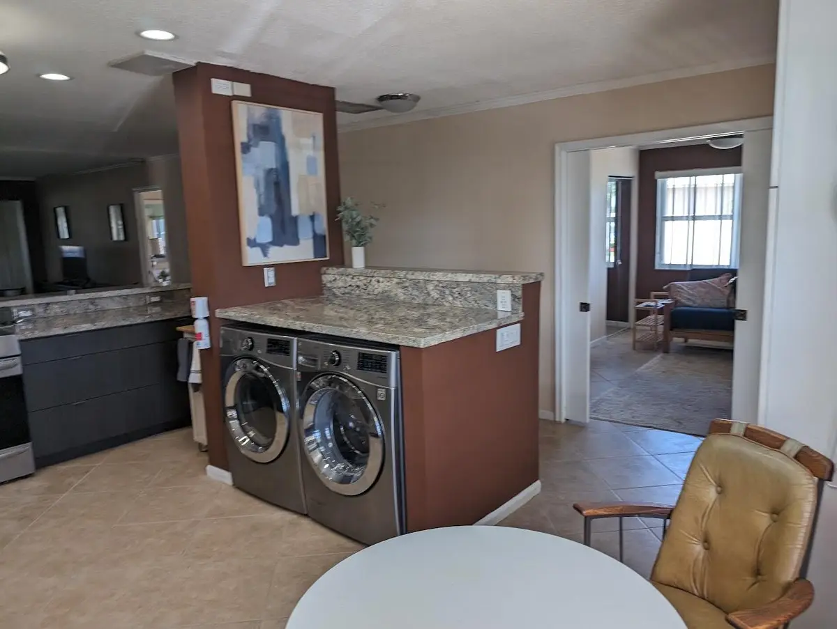 Pines laundry kitchen at 1710 NW 18th Avenue 204, Delray Beach