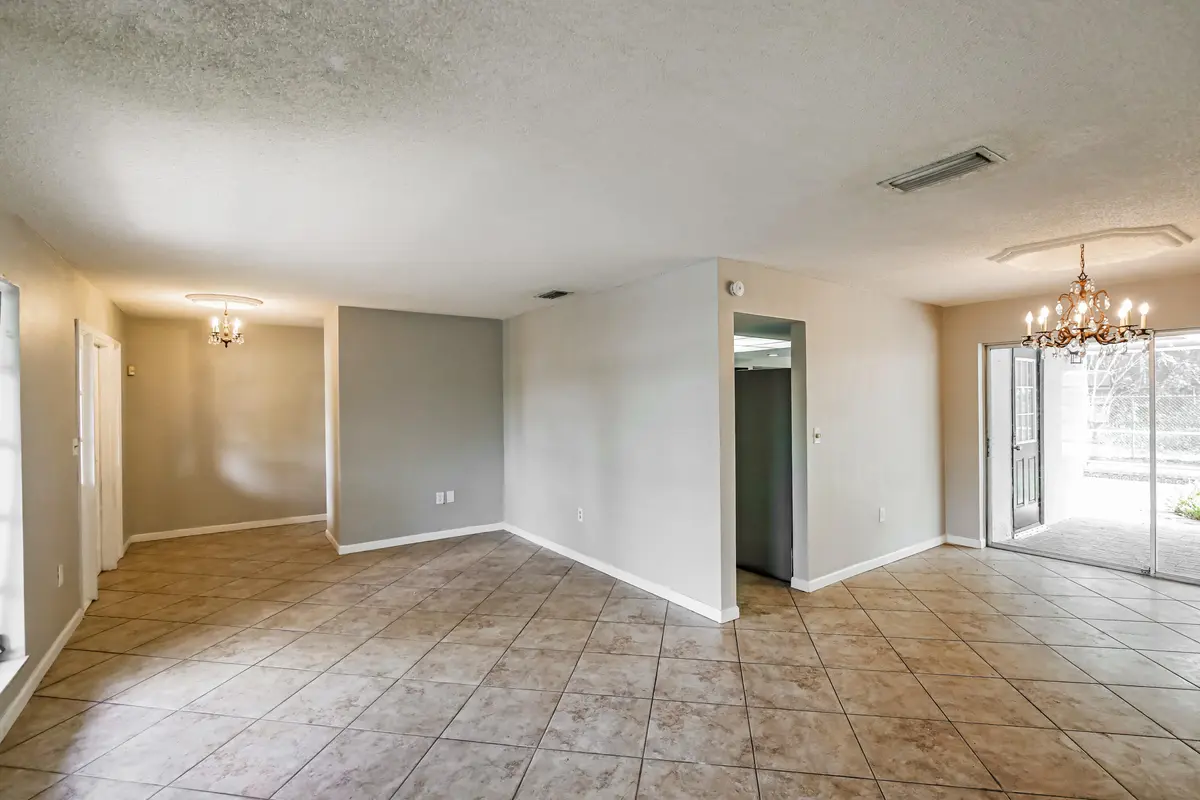 001-photo-living-room-15283355 at 8460 Southampton Drive, Miramar