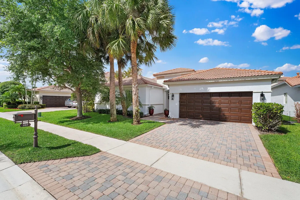 Front Exterior at 103 La Vida Court, Palm Beach Gardens