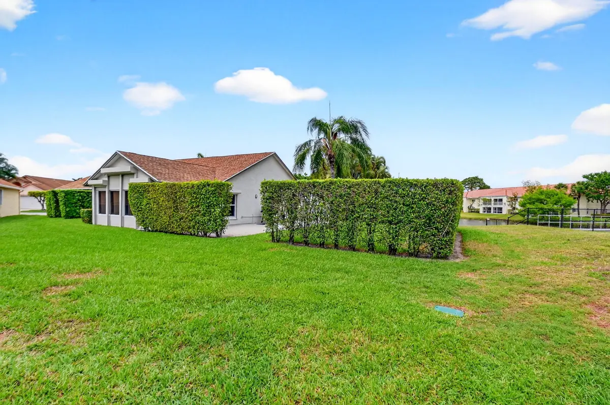 Side View Property at 5067 Robino Circle, West Palm Beach