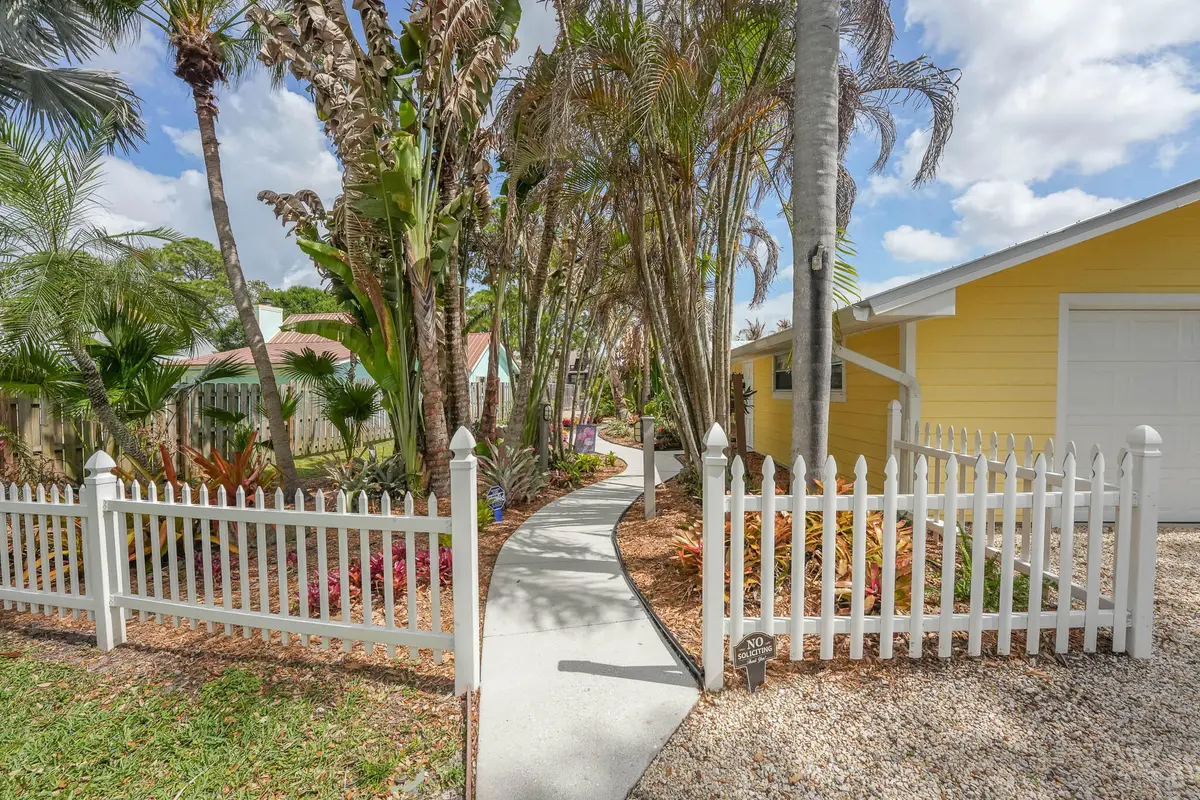 Path to front door at 1341 SW Evergreen Lane, Palm City